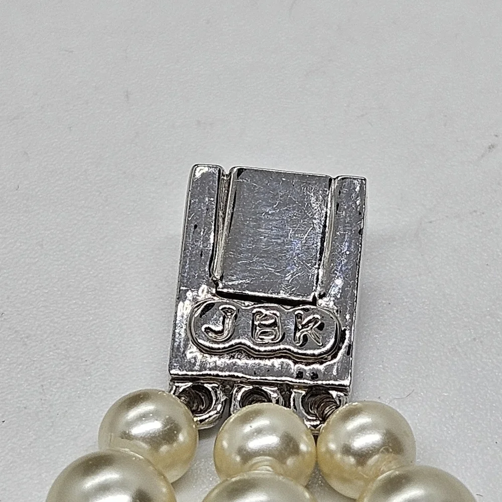 JBK three strand faux pearl necklace